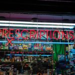 prescriptions-sign-on-a-drug-store-front-3652750